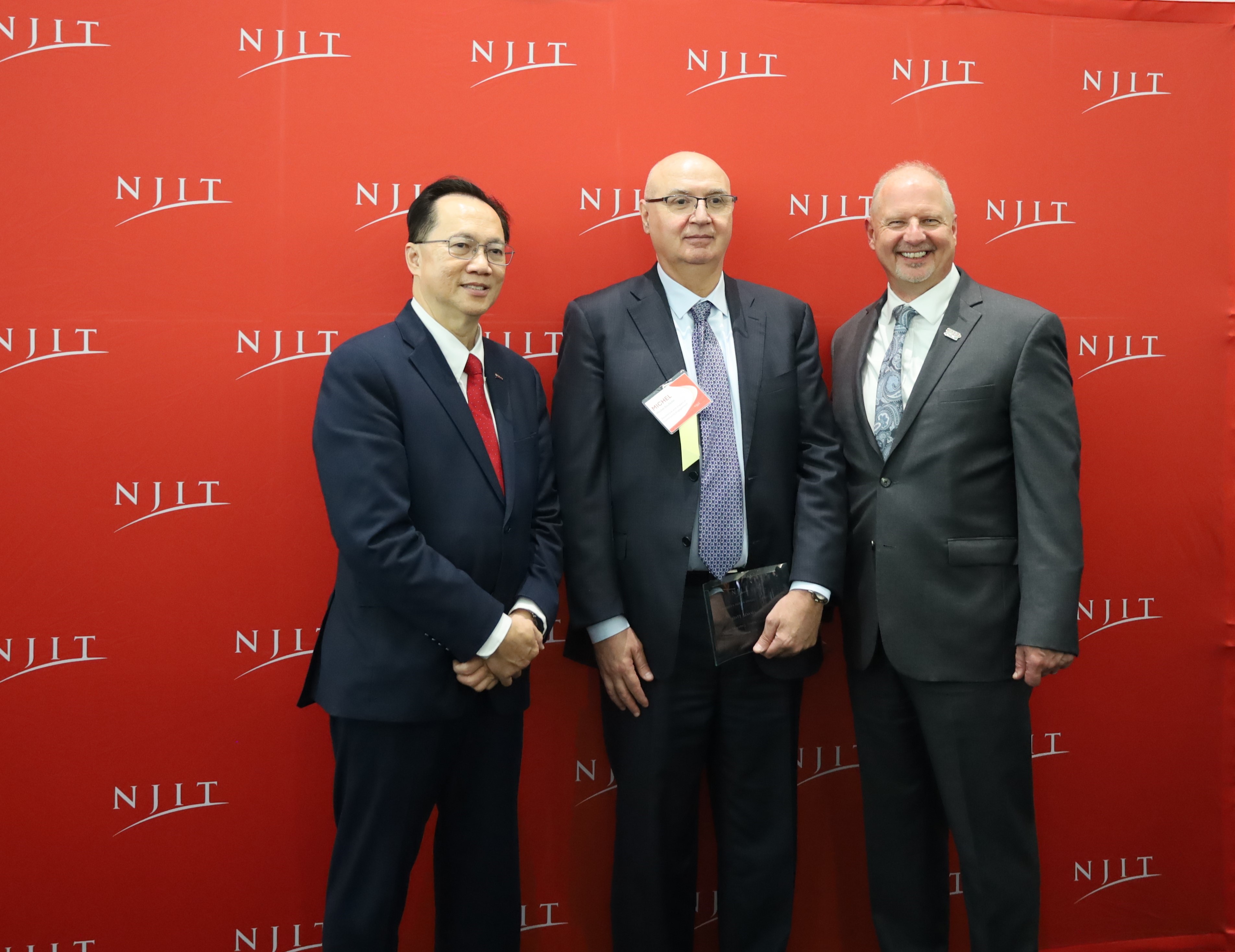 Michel Boufadel receiving the Nexus of Excellence Award