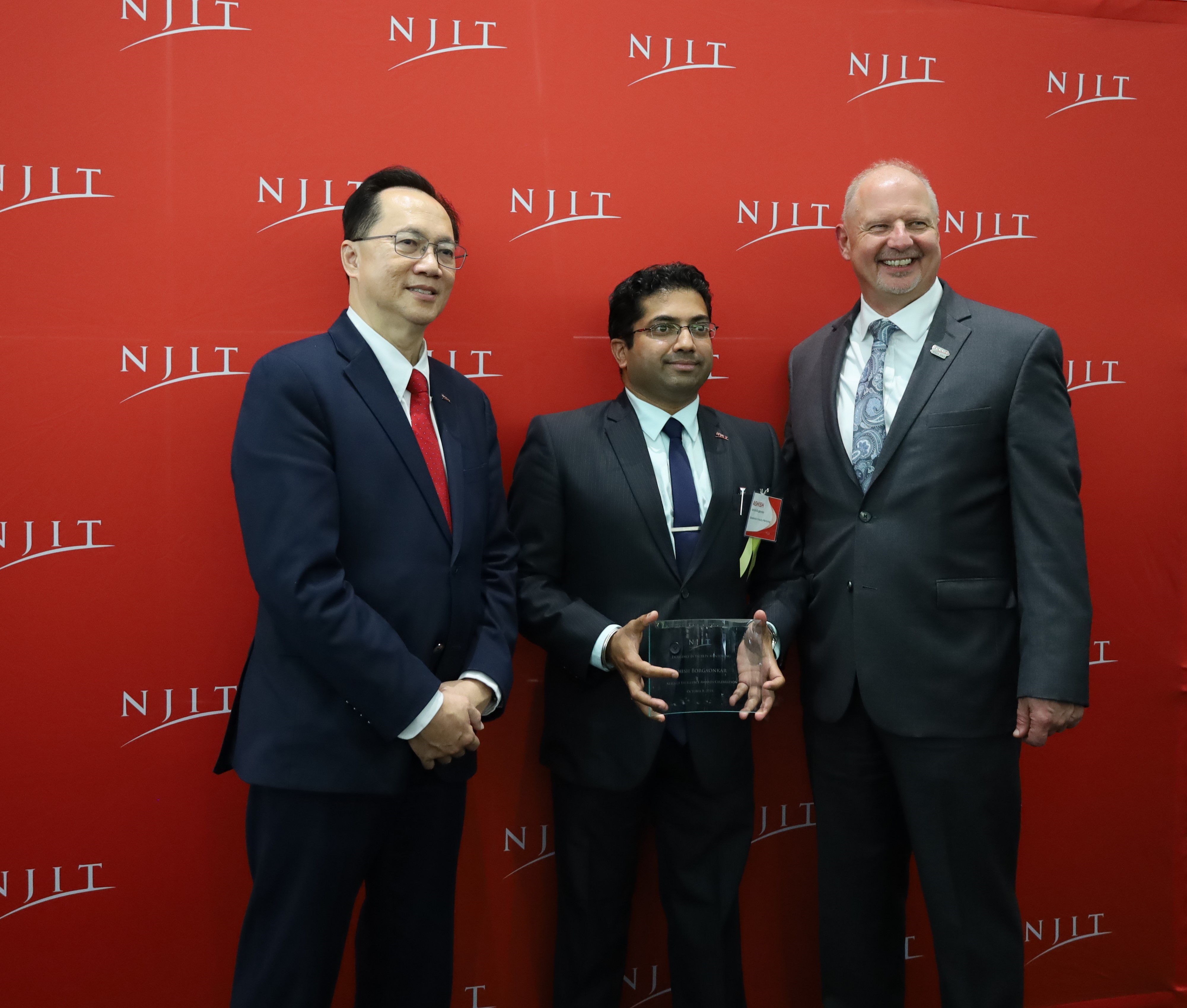 Ashish Borgaonkar receiving the Nexus of Excellence Award