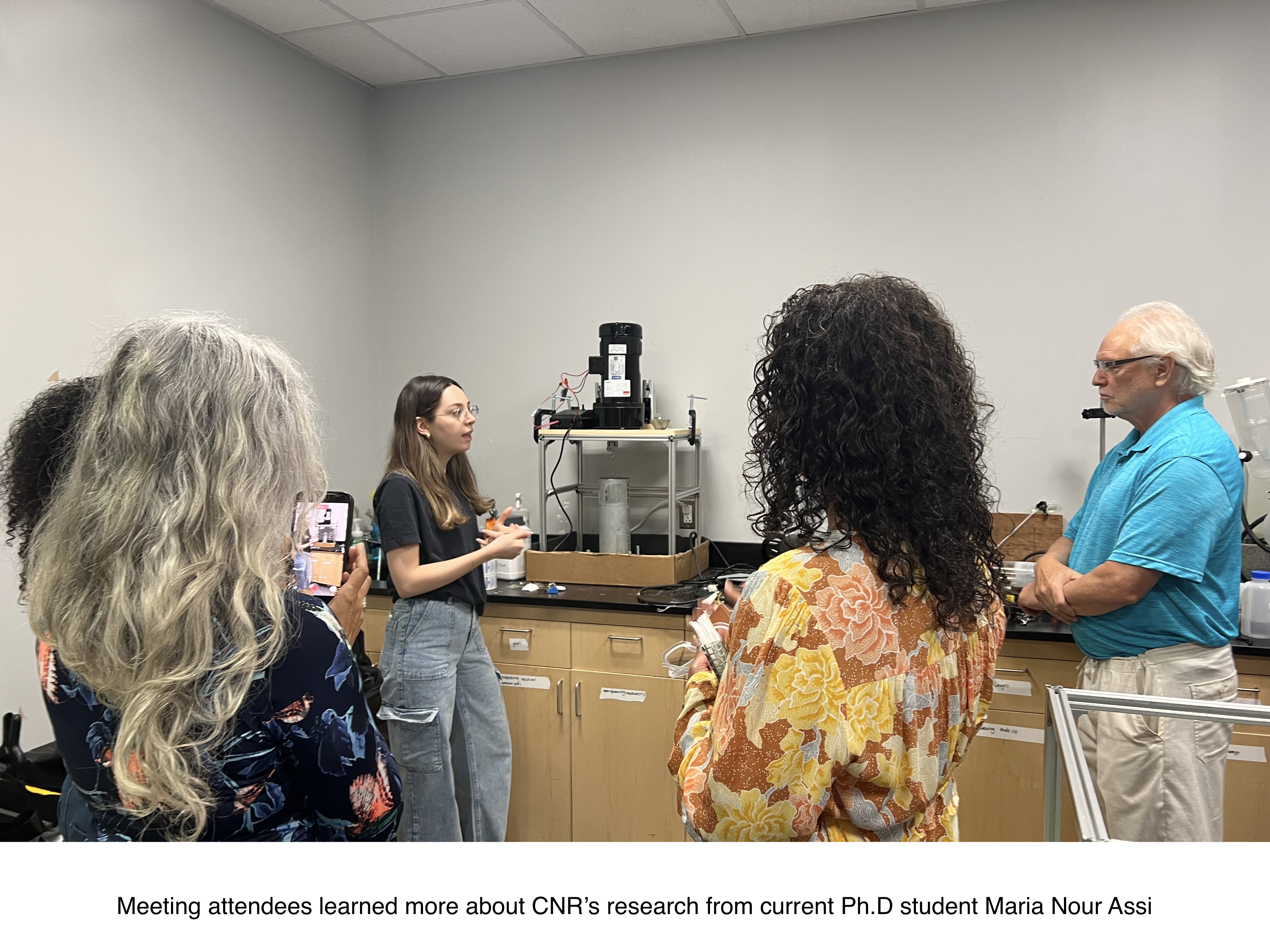 Current Ph.D student Maria Nour Assi sharing more about CNR's research with meeting attendees 