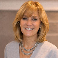 woman with blonde hair smiling