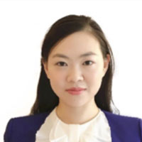 Woman with blue jacket and white blouse