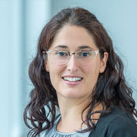 woman with eyeglasses and black jacket