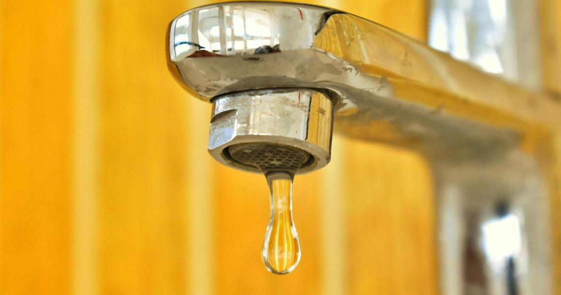 Water faucet dripping water